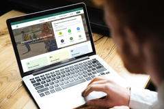 Person looking at ZAS homepage on a laptop