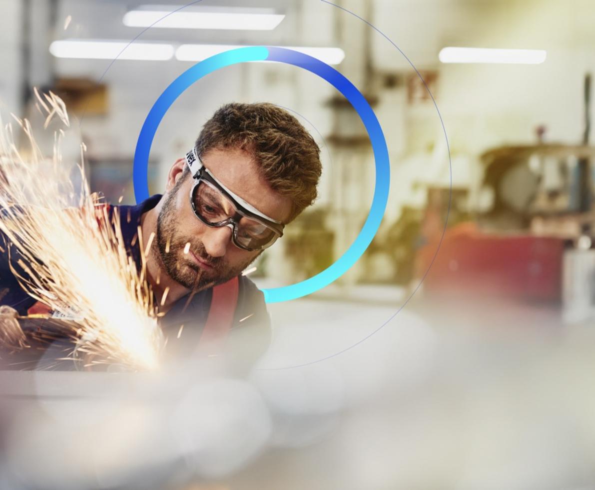 man working with machine sparks